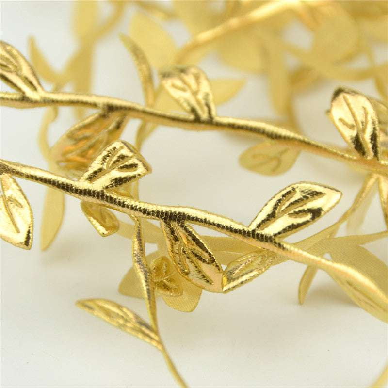 metallic leaf embellishment, rattan leaf decor, silk leaf garland - available at Sparq Mart