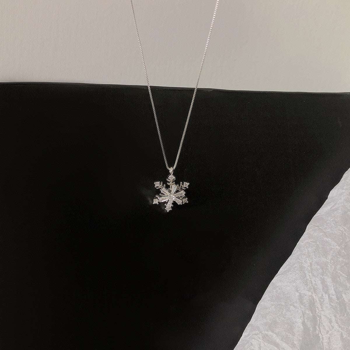 elegant silver necklace, rotating snowflake pendant, snowflake diamond necklace - available at Sparq Mart