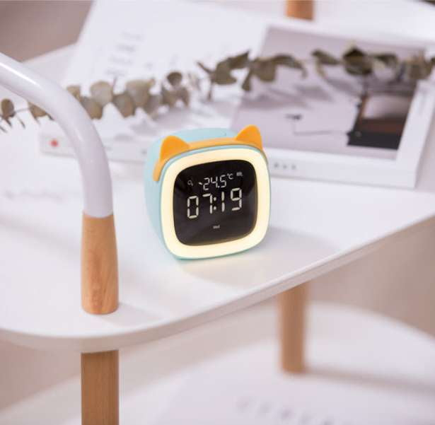 LED alarm clock, night light feature, temperature display clock - available at Sparq Mart